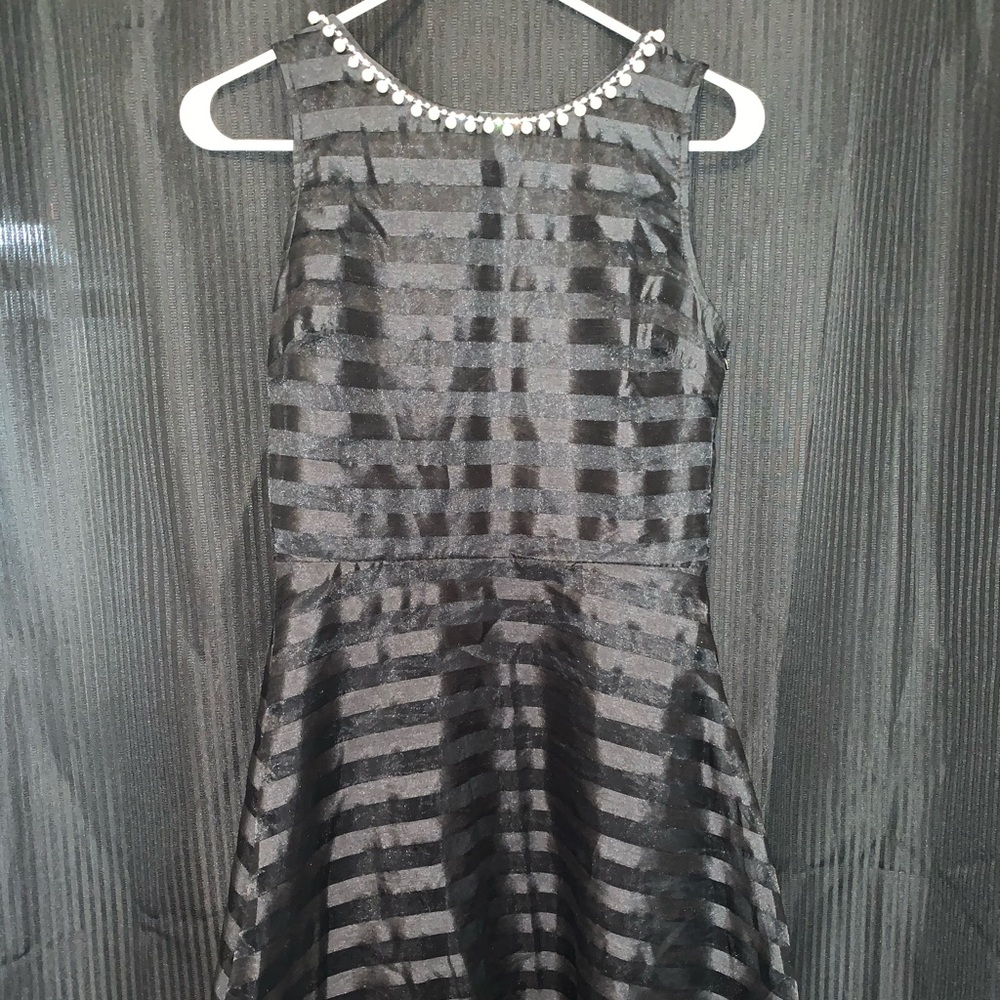 Black skater dress with pearl detailing